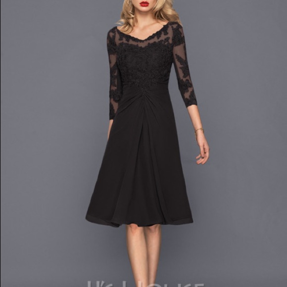 Women’s size 10. Black Dressy wedding cocktail dress . Chiffon ruching at waist.